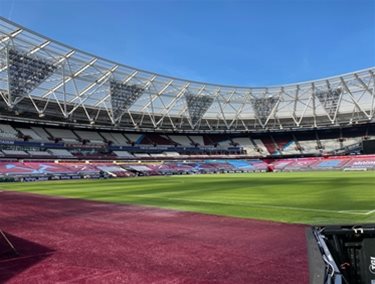 London Stadium view of the pitch from the players tunnel
